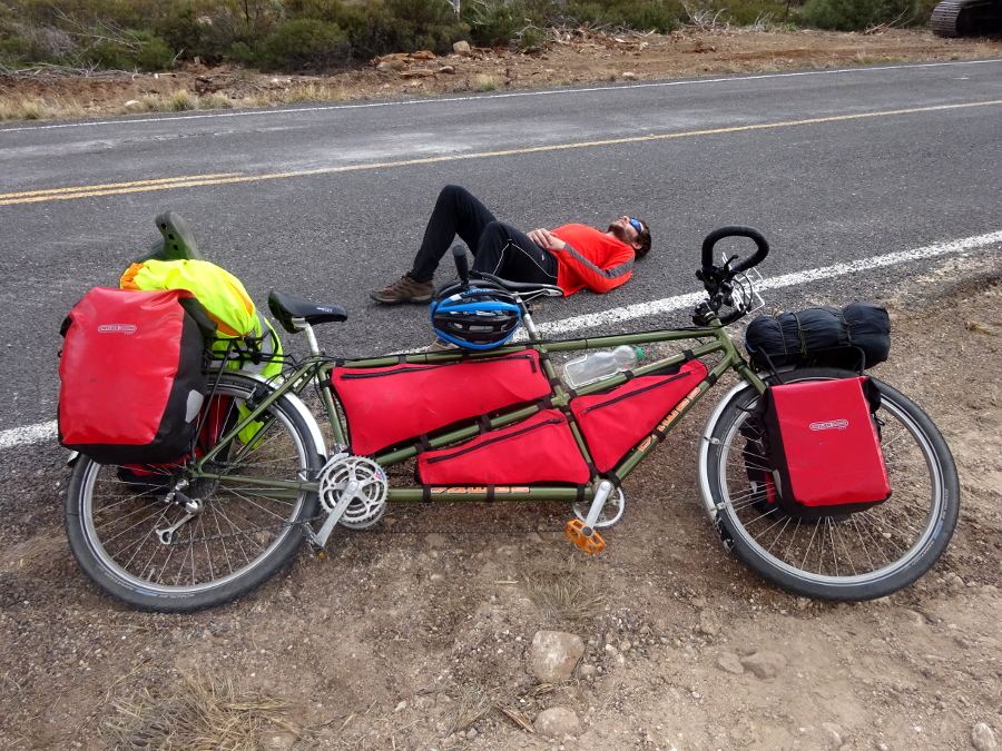 Lifelong Vagabonds completely exhausted from tandem cycling up a mountain